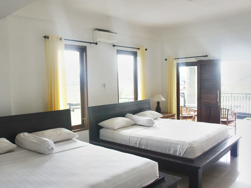 Putu Guest House Canggu Buitenkant foto