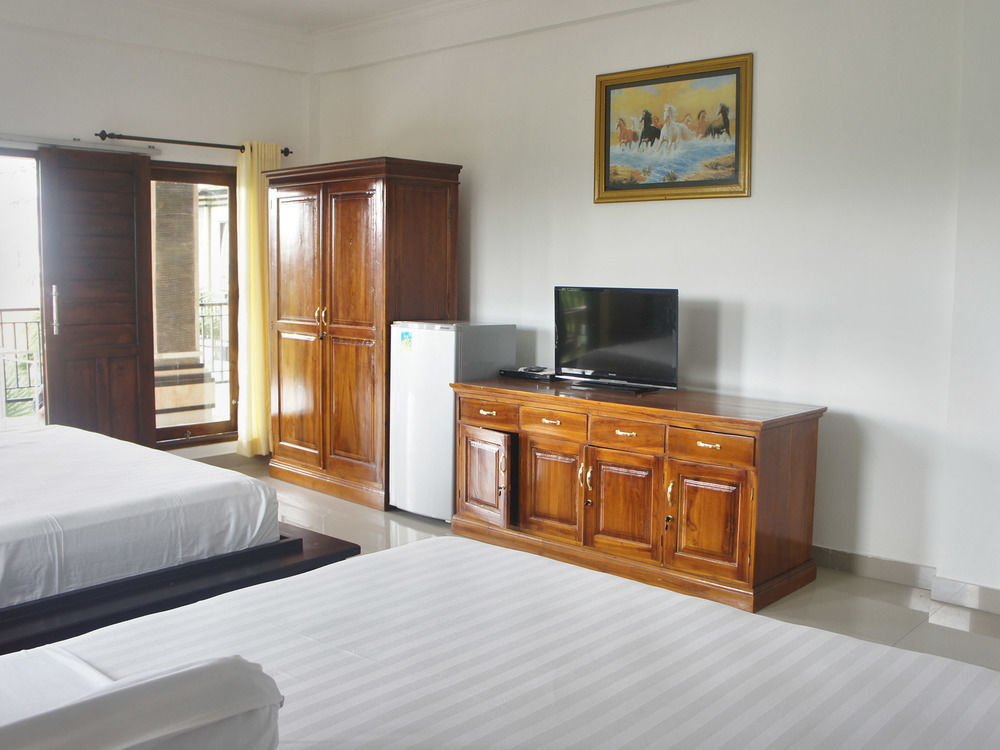 Putu Guest House Canggu Buitenkant foto