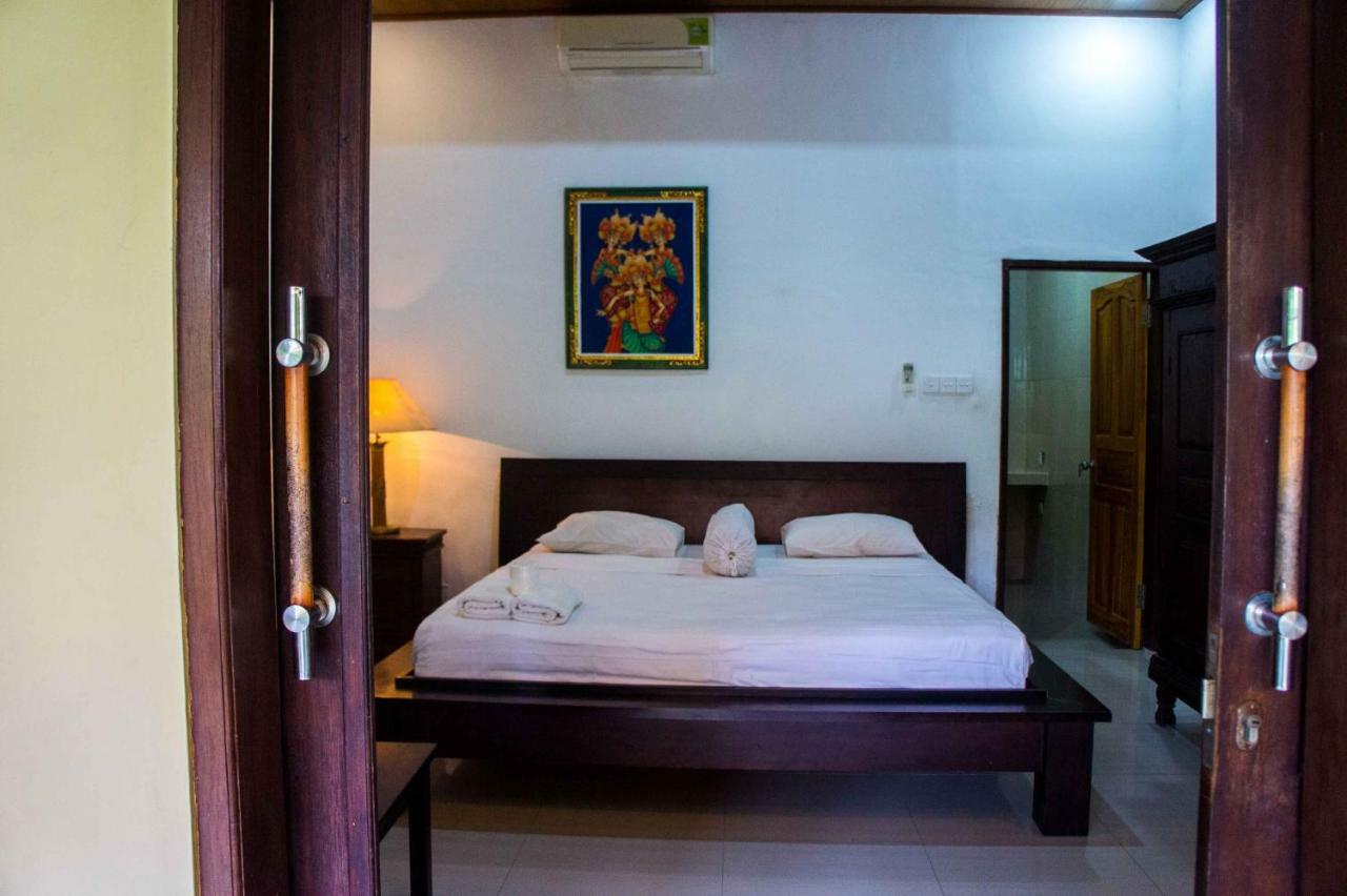 Putu Guest House Canggu Buitenkant foto