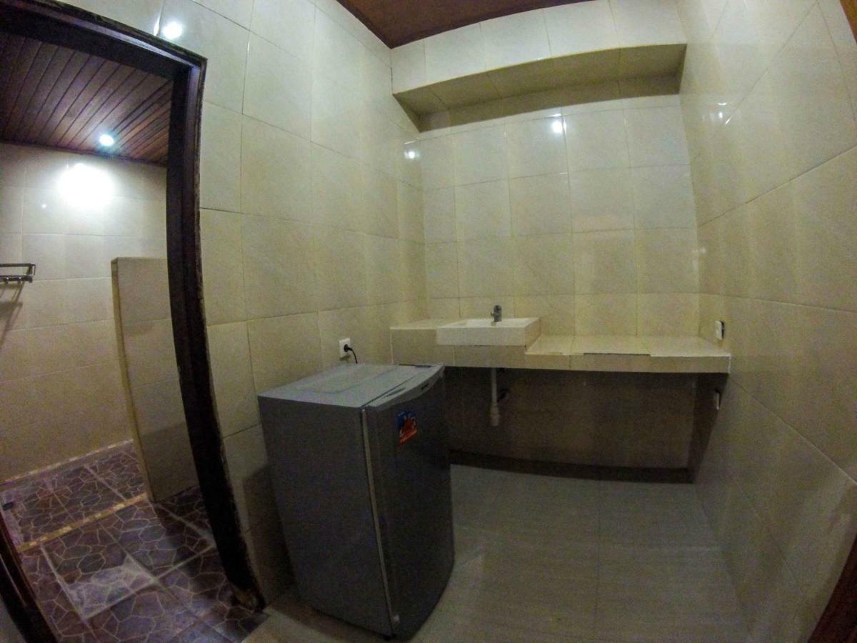 Putu Guest House Canggu Buitenkant foto
