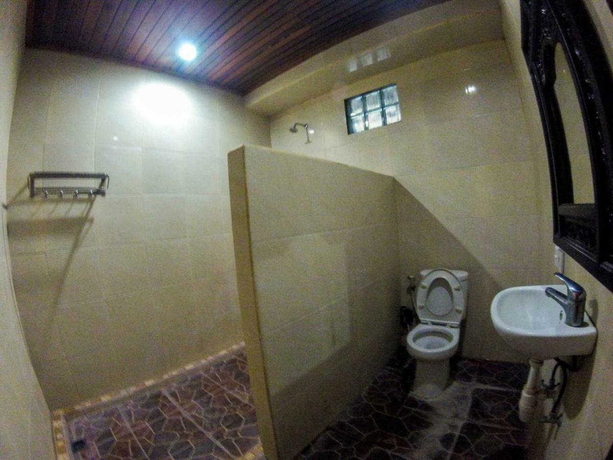 Putu Guest House Canggu Buitenkant foto